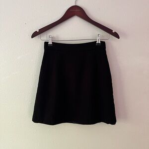 Bebe | Y2K vintage 100% wool black mini skirt with zipper